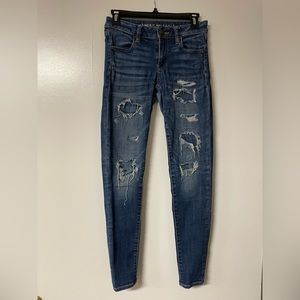 American Eagle Outfitter’s Next Level Stretch High Waisted Ripped Jegging Size 2